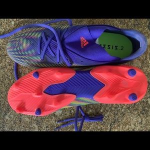 New men’s woman adidas cleats. Size 10.5 new. multi color never worn. soccer